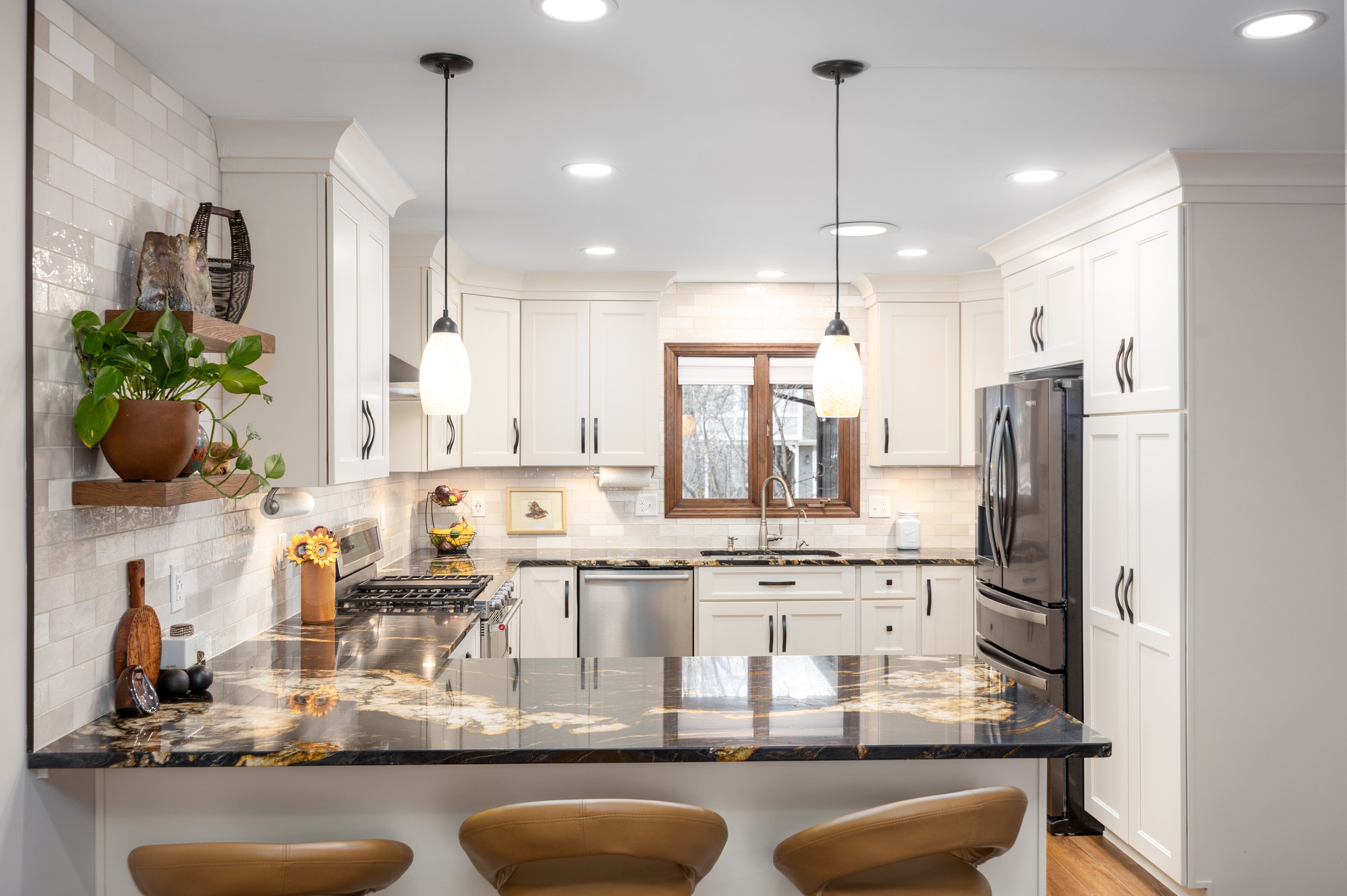 Worthington kitchen with a bright perimeter and substantial central island